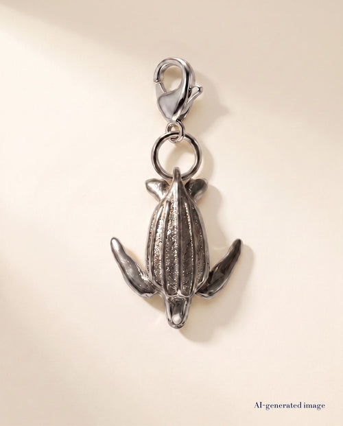 Collectable leatherback turtle charm 316L stainless steel - beige backdrop